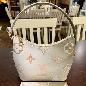 Louis Vuitton Marshmallow sand and Khaki bag.